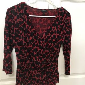 A faux wrap top in good condition